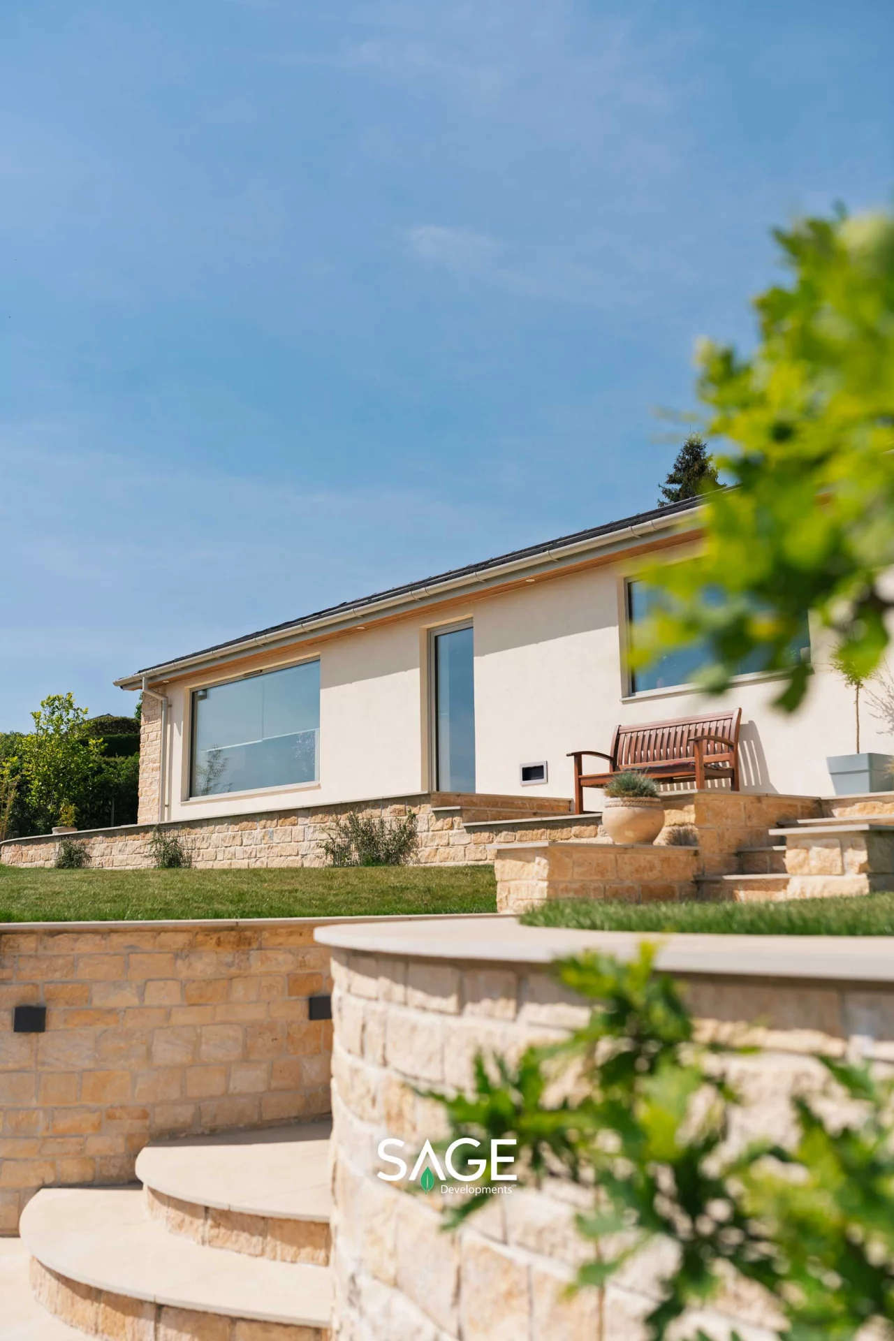 Profile view showing the integration of the bungalow with its sloped site levels.